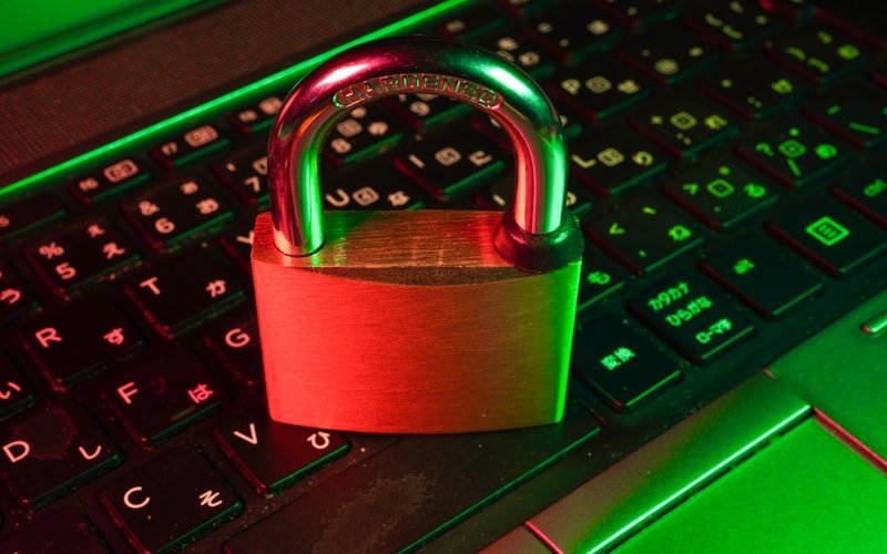 Digital privacy concept showing a padlock on a computer screen with binary code background representing data protection