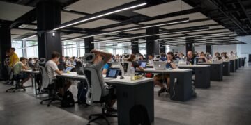 Modern corporate office with data dashboards