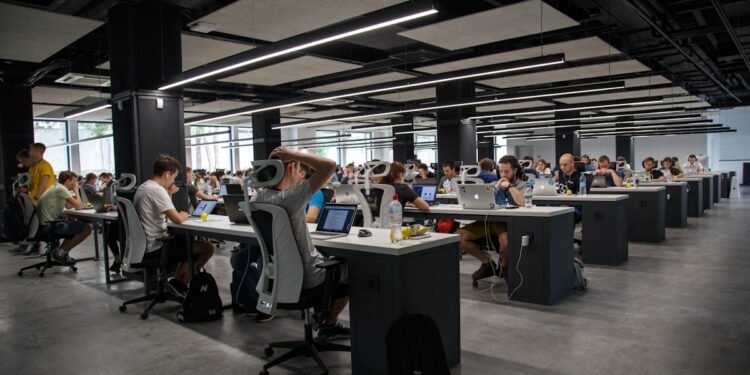Modern corporate office with data dashboards