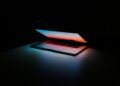 Person using AI tools on a laptop