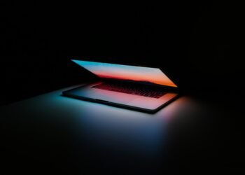 Person using AI tools on a laptop