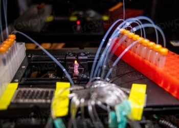 Biotechnology laboratory with scientists working on drug discovery