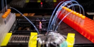 Biotechnology laboratory with scientists working on drug discovery