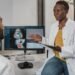 Healthcare professional using a computer in a clinical setting