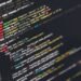 Developer working at startup Emergent on computer coding