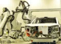 Humanoid robot in factory production line