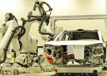 Humanoid robot in factory production line