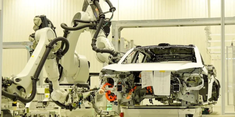 Humanoid robot in factory production line