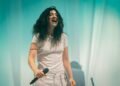 Lorde wearing sunglasses, referenced in AI glasses discussion