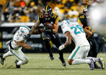 NFL football game with data analytics overlay