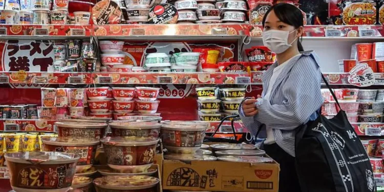 Japan supermarket shelves — central bank interest rate decision