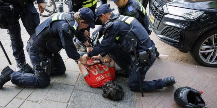 Morocco World Cup fans celebrations and police in The Hague