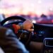 Waze navigation app showing Gemini voice search on smartphone dashboard