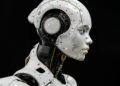 A white humanoid robot standing against a black background