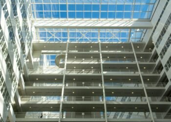 Atrium of The Hague city hall with white steel and glass galleries