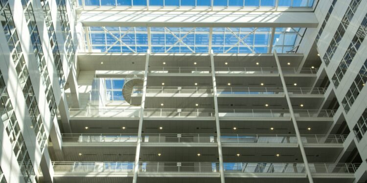 Atrium of The Hague city hall with white steel and glass galleries