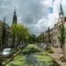 Canal in Delft lined with historic townhouses