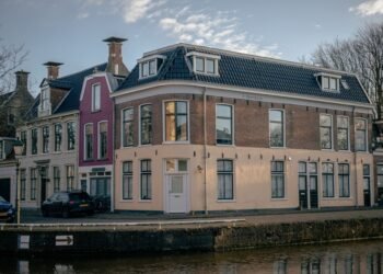 Traditional Dutch brick houses along a canal