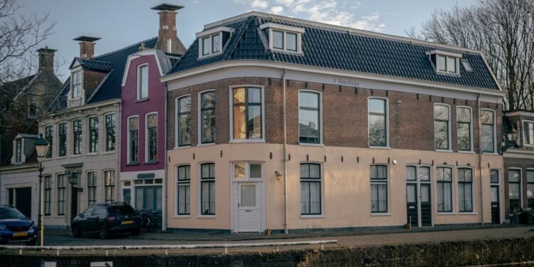Traditional Dutch brick houses along a canal