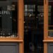Window of a wine bar in Amsterdam at night