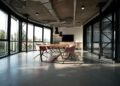Modern open-plan office with empty meeting table