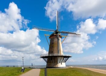A Dutch landscape with a windmill