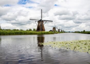 A Dutch landscape with a windmill