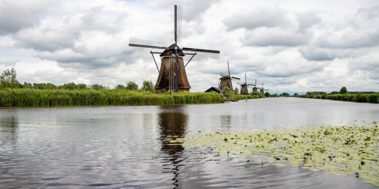 A Dutch landscape with a windmill